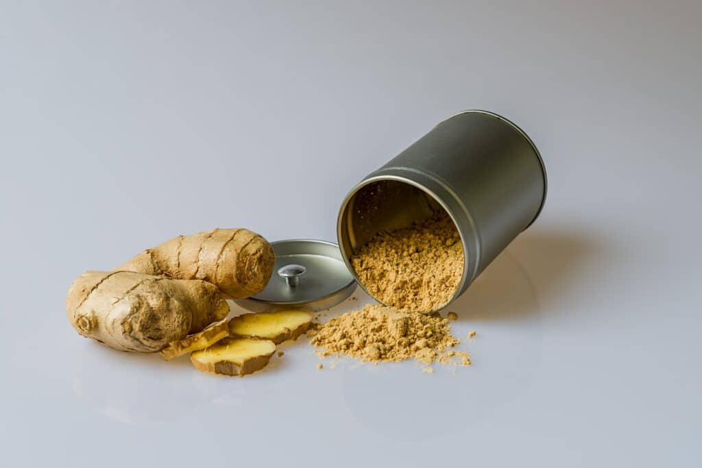 Ginger and ginger powder in a bottle