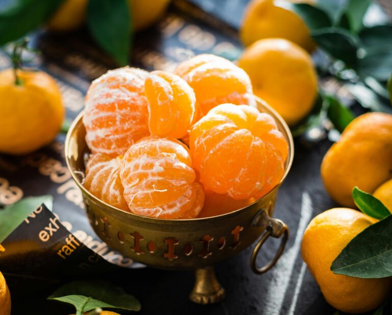 A bowl of peeled oranges